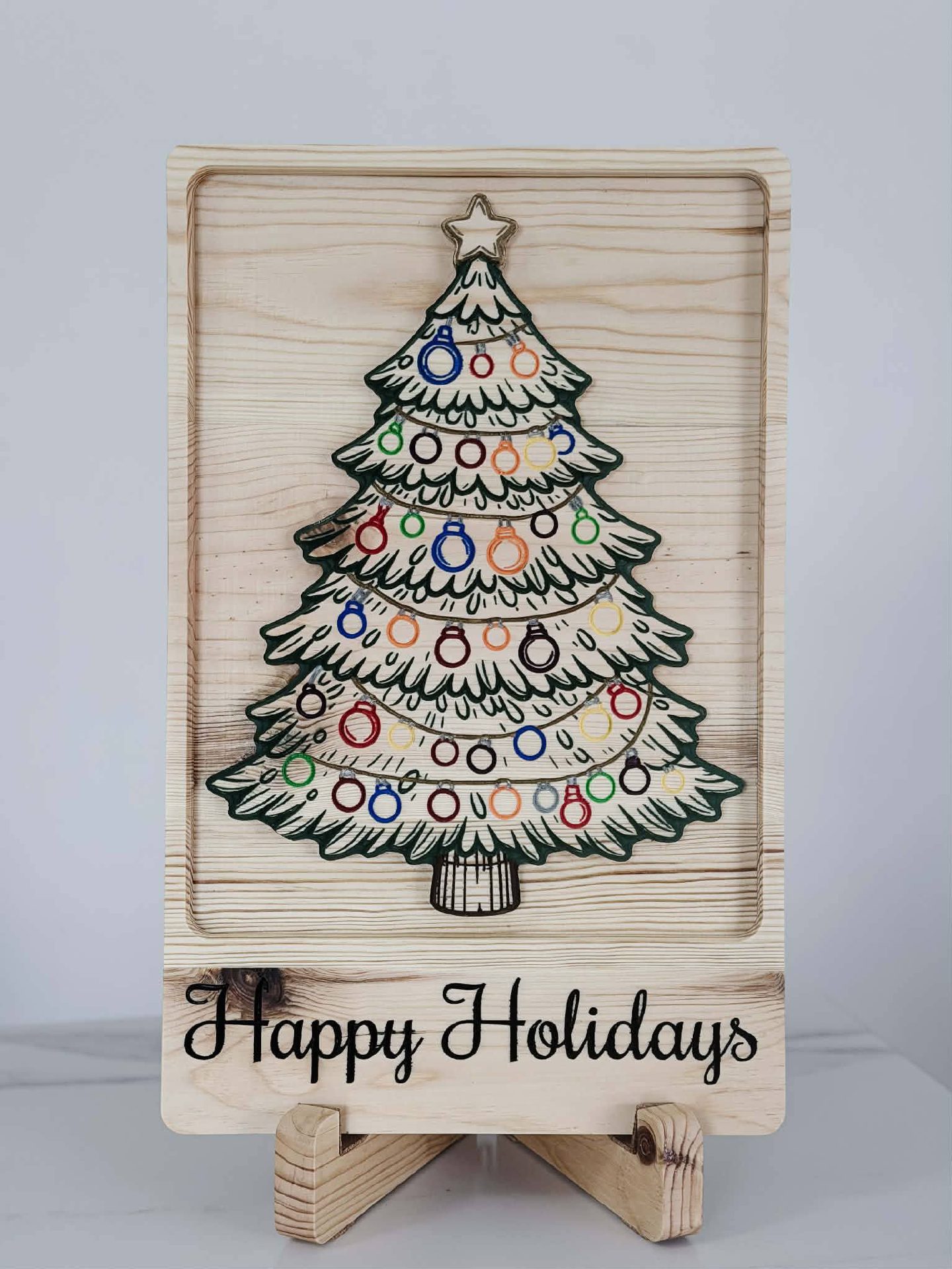 Solid wood Happy Holidays sign with a 3D carved tree design