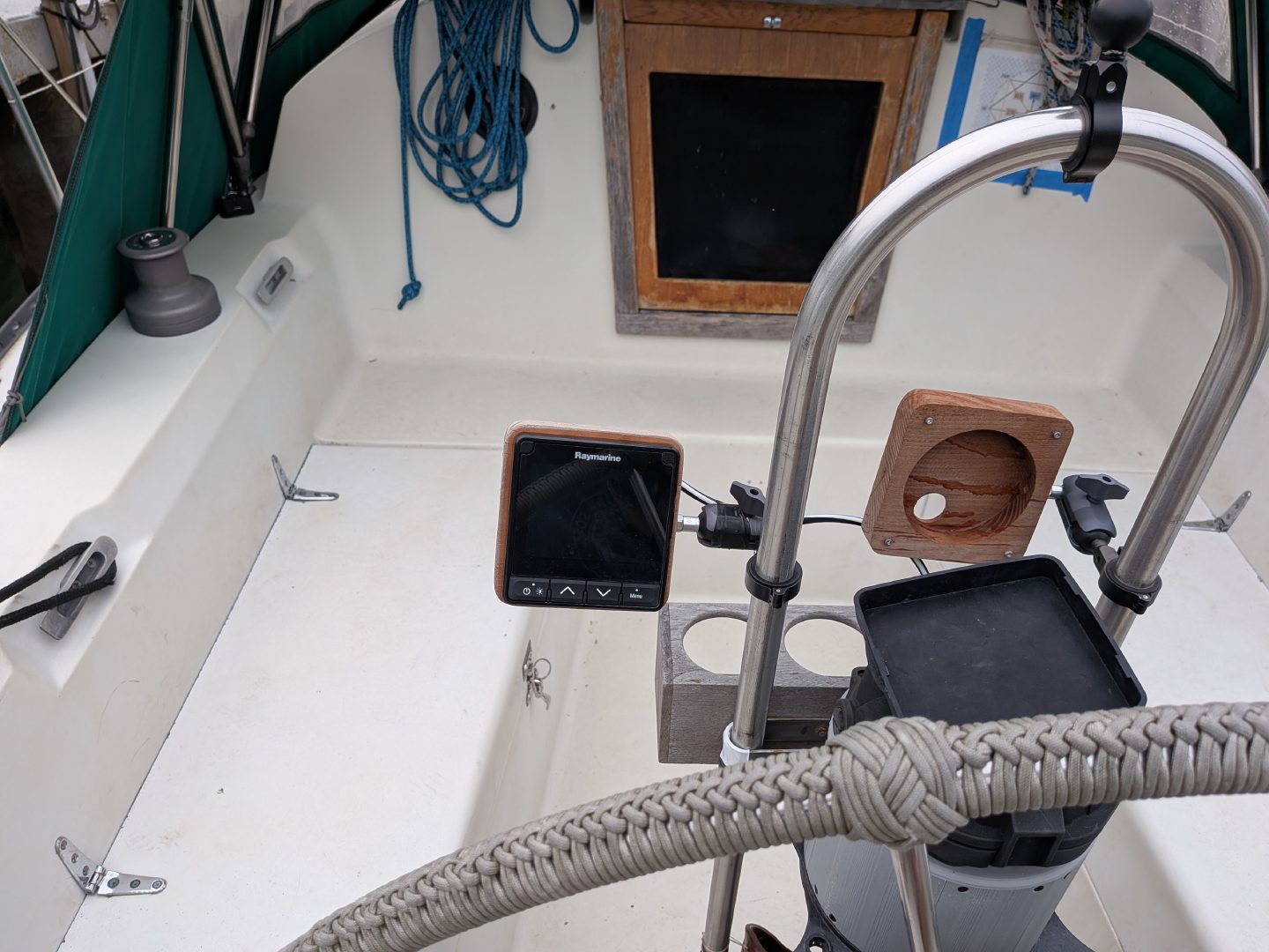 Raymarine i70s display mounted on a binnacle post via a custom wood mount