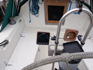 Raymarine i70s display mounted on a binnacle post via a custom wood mount
